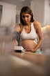 © milanmarkovic78 - Worried Pregnant Woman Measuring Blood Pressure