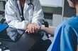 © Ketnapa - Male doctors shake hands with patients encouraging each other and praying for blessings. To offer love, concern, and encouragement while checking the patient's health. concept of medicine