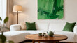 © Adobe Contributor - A cozy living room featuring a white sofa, green abstract painting, coffee table with teapot and cups, and a floor lamp for a relaxing ambiance.