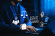 © Supatman - Estate planning concept. Businessman using digital interface for managing legal documents, assets, house, family inheritance, and will preparation, insurance, testament, financial security, and trust.