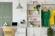 © Pixel-Shot - Interior of home office with workplace, closet and folding screen