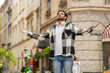 © Andrii Iemelianenko - Keep calm down, relax. Young Indian man meditating, breathes deeply with mudra gesture, praying eyes closed, concentrated thoughts, peaceful mind outdoors. Guy taking a break in urban city street.