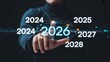 © millennium - Hand Interacting with Futuristic Holographic Year Selector Highlighting 2026 in Digital Interface