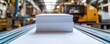 © ivona - Stacking freshly cut paper sheets in factory.