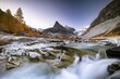 © Robert Haasmann/imageBROKER - Mountain stream with autumnal larches and mountain views, Mont Mine, Ferpecle glacier, Val d'Herens, Canton of Valais, Switzerland