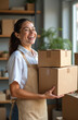 © Pete - Young woman entrepreneur happily holds package boxes ready for delivery. Smiles, laughs, prepares client orders for shipping. Small business owner busy with online store sales management. Happy about