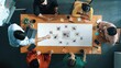 © InfiniteFlow - A dynamic group of individuals engages in a collaborative brainstorming session, sharing innovative marketing ideas and strategizing in a modern office environment. Raster