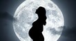 © Anwarul - Silhouette of pregnant form against full moon