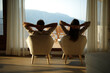 © Antonioguillem - Back view of a couple relaxing at home looking through a window