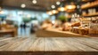 © Dao - Wooden board empty table background. abstract blurred bakery shop background