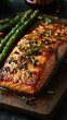 © Лаra Wladdim - Grilled salmon steak with green asparagus in teriyaki sauce on a wooden table