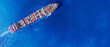 © APchanel - Arial view drone camera transportation logistics and container dock cargo yard shipyard with transport logistic import export with blue open ocean.