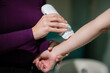 © Zoran Jesic - Physiotherapist using laser therapy on patient arm