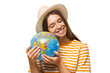 © Damir Khabirov - Smiling young traveler holding a globe with warmth, showing her love for exploring the world