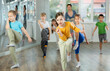 © JackF - Group of boys and girls rehearsing hip hop dance in studio