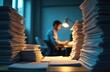 © Viktor - Man working late at night in office. Piles of paperwork surround him. Businessman works overtime at desk with documents under lamp light. Exhausted employee is stressed.
