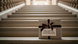 © Biyumi - Elegant Gift Box with Brown Ribbon and Anticipation Tag on Staircase Steps