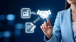 © Zucide - Businesswoman Partnership Agreement Initiate with a Hand Touching an AR Partnership Icon on a Network of Growth and Document Symbols for Business Collaboration and Deal Formation