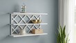 © kaowsar - Decorative white lattice wall shelves displaying small items