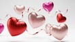 © Cealv - Multiple textured metallic hearts in shades of pink and red are floating with swirling ribbons, captured in a romantic high-key studio shot against a bright white background.