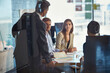 © ReeseBuyout4/peopleimages.com - Review, meeting or people in office with guidance, brief or discussion for brand image. Collaboration, ideas or marketing director in agency with team, plan or manager feedback for business identity.