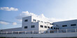 © Rangsarit - Factory Industry Building Panoramic Background, Architecture Large Warehouse with Louver Ventilation and Ladder on White Aluminium Wall against Blue Sky Backdrop Design, Front view with copy space