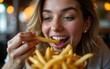 © Christian - Close-up of woman eating French fries in a pub. High quality
