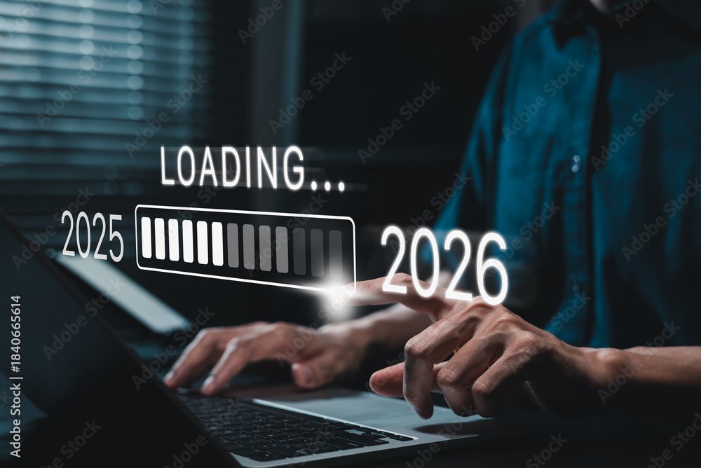 Progress and transition from 2025 to 2026 concept. A person pointing to ...