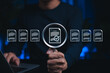 © Supatman - Document verification concept. Person holding magnifying glass highlighting approved file, symbolizing data review, quality control, check, audit, certificate, legal approval, information validation,