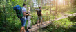 © Branimir - Teenagers Hiking in Mountain Forest – Outdoor Adventure Set