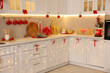 © New Africa - Stylish kitchen with Christmas decor. Interior design