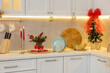 © New Africa - Beautiful Christmas decor on countertop in kitchen. Interior design