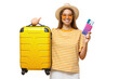 © Damir Khabirov - Portrait of happy excited young woman tourist holding large suitcase and passport with flight tickets