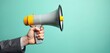 © Viktor - Man in suit holds megaphone, signaling announcement. Person communicates loud message, calling attention. This visual signifies promotion, protest, or public speaking.