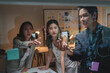 © crizzystudio - Business team collaborating on planning using a glass board