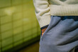 © Sopear - man putting his hand in his pants pocket