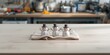© The 2R Artificiality - Table with ferritic cores shaped like snowmen used for inductivity coils and transformers, manufacturing efficiency