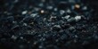 © TheWaterMeloonProjec - Wood ash in a fireplace with defocused charcoal cinder textured background, focusing on maintenance and safety