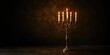 © Seyyar - Burning candles in a vintage candelabra with gold accents, festive holiday lighting, Christmas celebration
