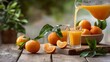 © Maryia - Fresh tangerine juice being poured into glass surrounded by whole fruits, slices and leaves on rustic table forming natural outdoor scene with gentle depth and balanced composition