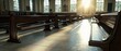 © pvl0707 - Sunlight streaming through stained glass windows illuminates a quiet church interior filled with wooden pews at dusk