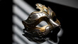 © Naima's Art - A single intricate venetian carnival mask with gold and silver details is elegantly displayed on a reflective dark surface, showcasing its exquisite craftsmanship and design