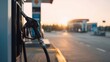 © Jon Stock - Fuel pump at a deserted gas station during sunset, showcasing a peaceful evening atmosphere and the quiet end to a busy day