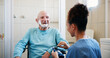 © SnapK/peopleimages.com - Senior man, nurse and shaving cream in bathroom with wheelchair, happy and talk with grooming in home. People, caregiver and elderly person with disability, foam or facial hair removal in retirement