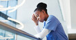 © SnapK/peopleimages.com - Medical, low angle or nurse in hospital with thinking, patient loss or stress in surgery result. Healthcare, reflection or black woman in clinic with guilt, disappointment and worry in emergency risk