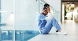 © SnapK/peopleimages.com - Nurse, woman and stress in clinic hallway for patient loss, bad news and medical trauma on floor. Health professional, black person or anxiety in corridor for healthcare fail, hospital grief or space