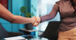 © SnapK/peopleimages.com - Business people, office and shaking hands for agreement, deal or financial partnership with merger. Company acquisition, handshake and collaboration for investment with support, trust and thank you