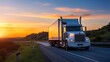 © Kazi - A sleek white semi truck drives on a highway during a vibrant sunset with rolling hills and a beautiful orange sky.