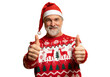 © opolja - Merry satisfied smiling mature man wear knitted christmas sweater Santa hat posing showing thumb up like gesture wink isolated on transparent background Happy New Year 2026 celebration holiday concept