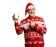 © opolja - Joyful mature man holding smartphone with empty screen, posing in Christmas sweater and Santa hat on transparent background. Winter holiday promotions. New Year 2026 Christmas